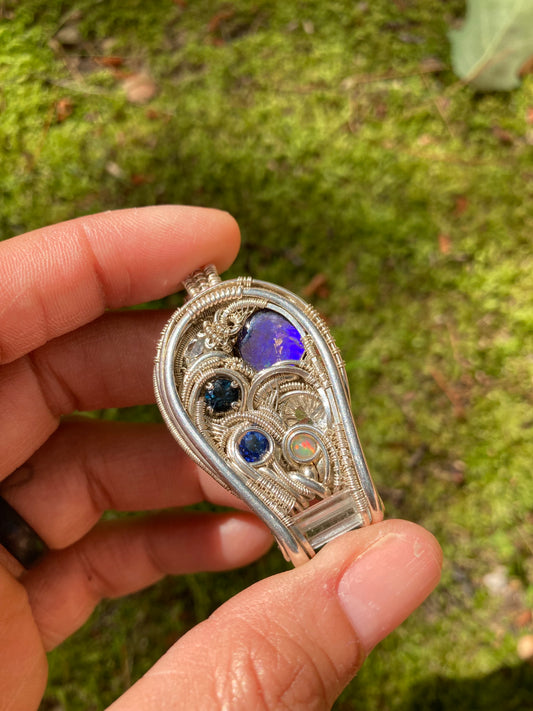 Silver Pendant W/ Ammolite, Kyanite, Quartz, Aquamarine, Topaz & Opal